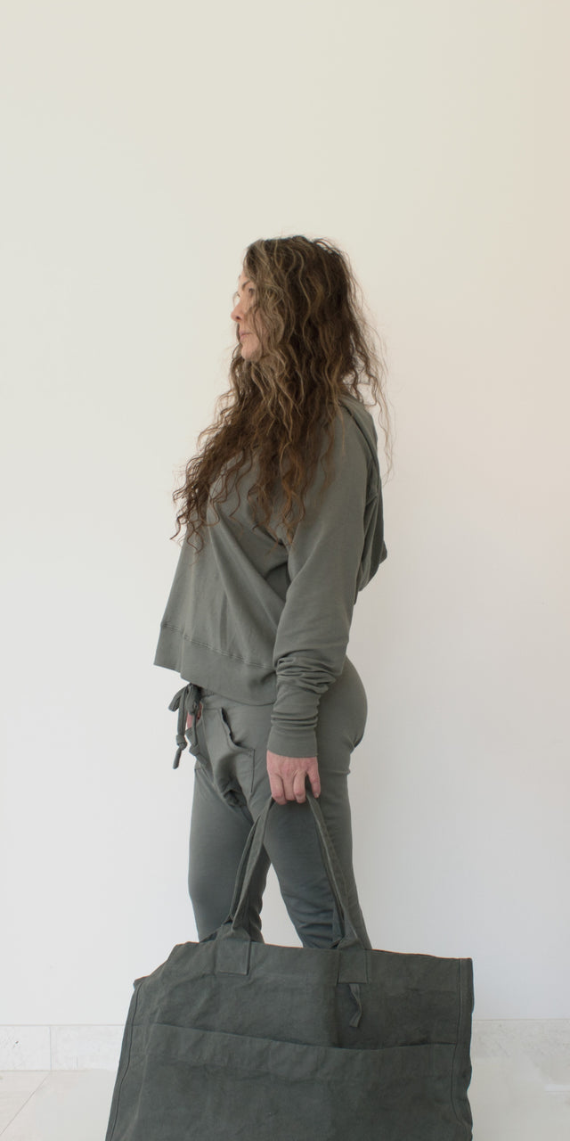 Tailored from supremely soft Supima® Cotton and TENCEL™ Modal French Terry and Rib.  Our classic versatile raglan oversized hooded sweatshirt was created to cozy up in providing enough warmth worn simply alone or by layering.  Designed with wide rib cuffs along with a rib detailing throughout the entire over-sized hoodie creates enough generous room to cover up more than ever for those cool breezy days and chilly nights.