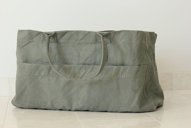 For the wanderer who has dreams to a destination where no one has traveled. Foraging from the beginning to the end with endless possibilities our H&C Haversack is an essential. Traveling outdoors our haversack is the perfect large tote to carry all your belongings. Whether it's an escape in our rugged outdoor living or a getaway to the sandy seashores.  Our Vintage washed Haversack bag has rugged and tattered areas adding a vintage feel and look.